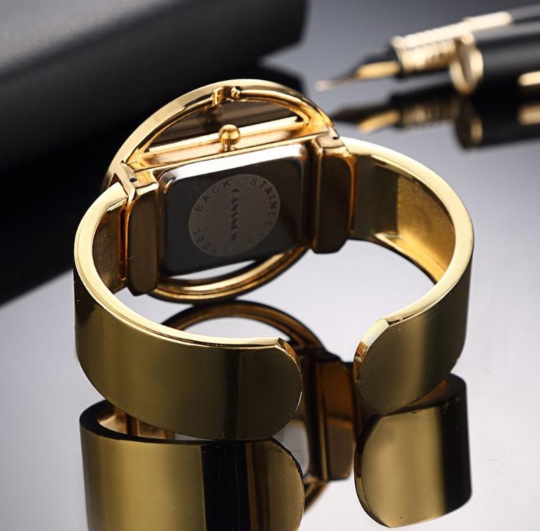 Women's Luxury Fashion Watch with Gold Steel Band and Black Dial