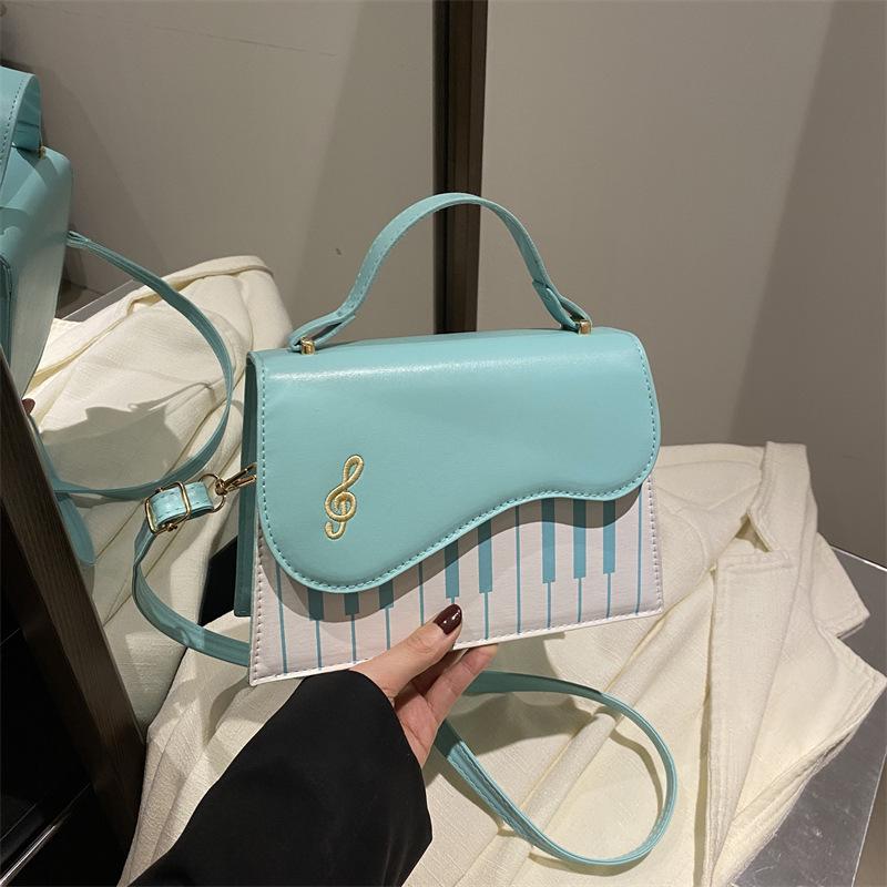 

2025 autumn and winter new contrasting colors simple trend shoulder bag casual foreign style versatile temperament design messenger bag синій