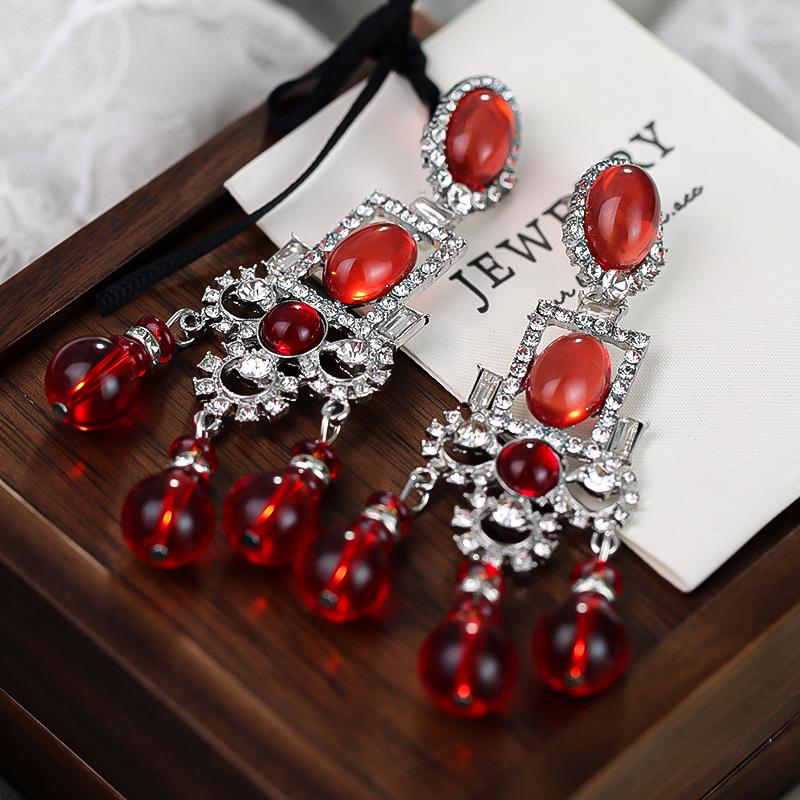 

Vintage Ethnic Ruby Tassel Earrings - Long, Retro, and Bold Design