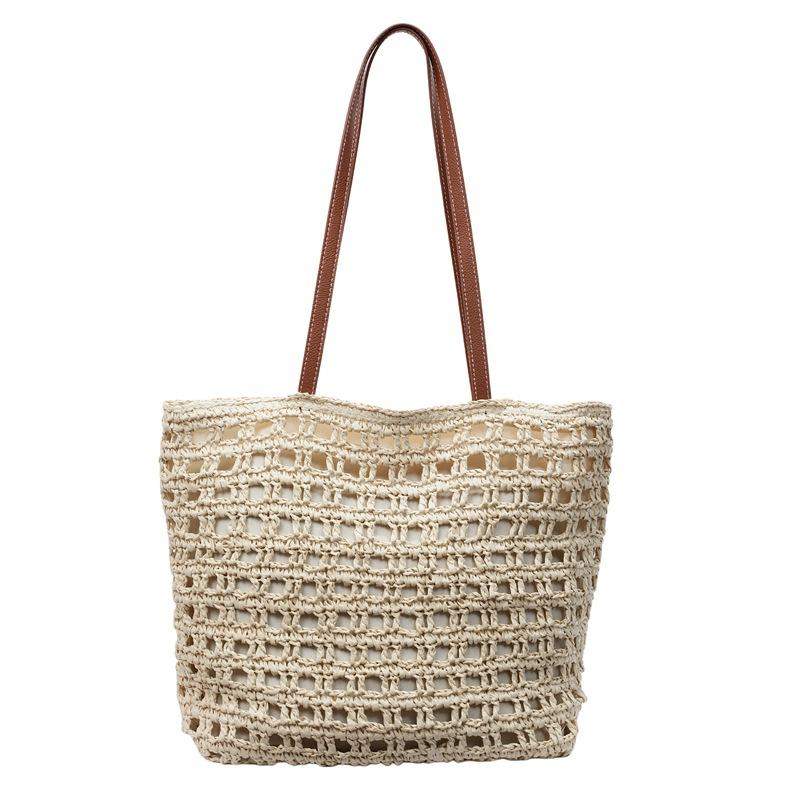 Handwoven Straw Tote Bag with Leather Handles and Open Weave Design Perfect for Summer Beach and Casual Outings