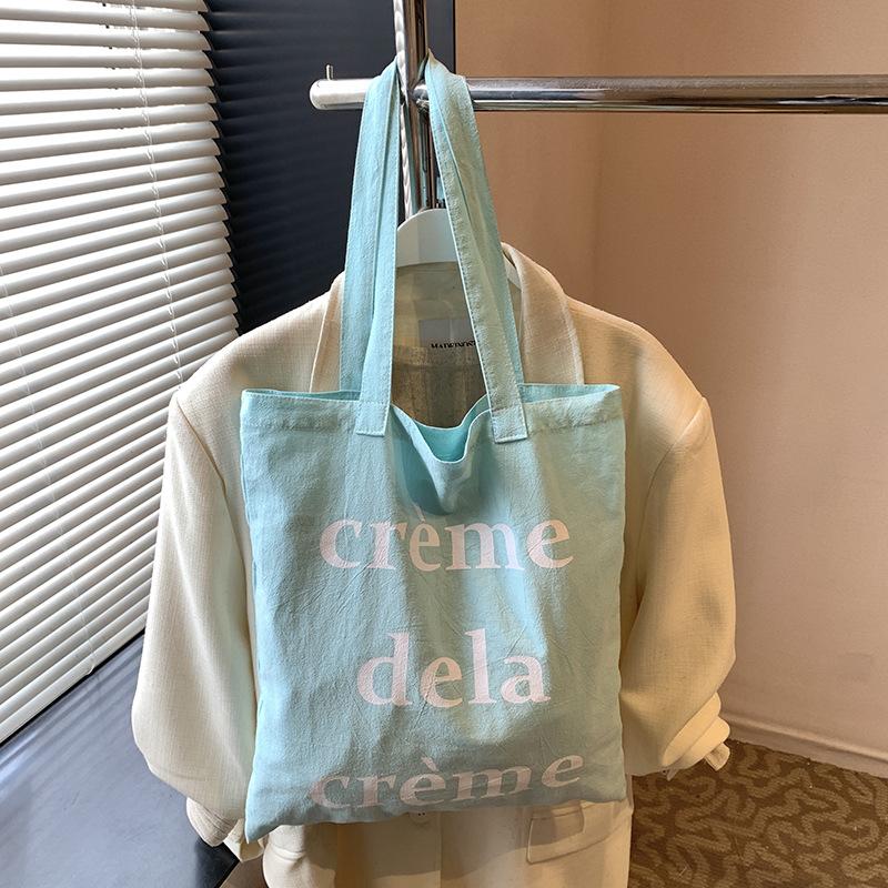 

Versatile canvas bag 2025 new large-capacity commuter canvas bag summer candy color small fresh shoulder bag 37.5*0.5*41 зелёный