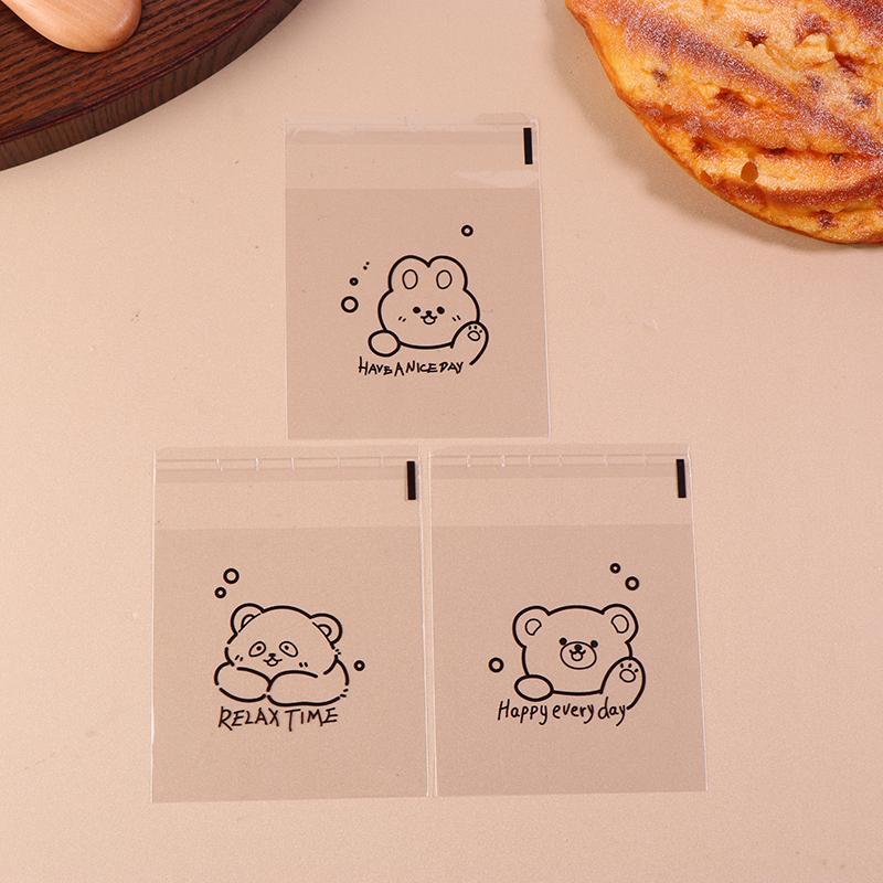 100 de bucăți cu model de urs de desene animate, paine transparentă, ambalaj cadou, pungă cu auto-sigilare, binecuvântare de zi cu zi fericită, pungi pătrate Opp imprimate
