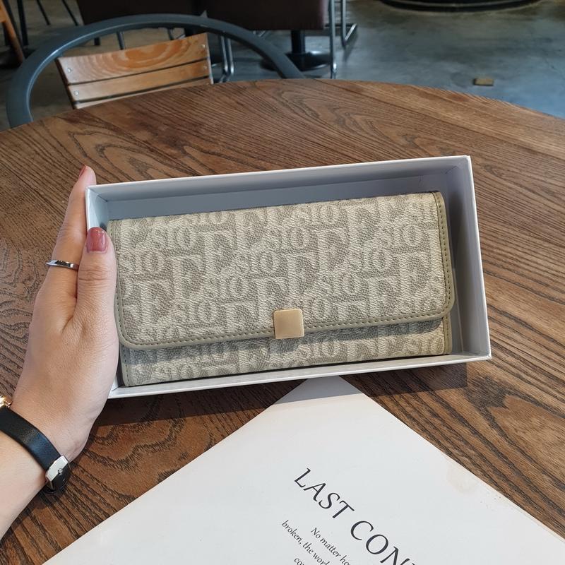 

2025 Новые длинные женские кошельки из натуральной кожи с буквенным принтом, женский кошелек из коровьей кожи, вместительный, 2-складной клатч, бумажник