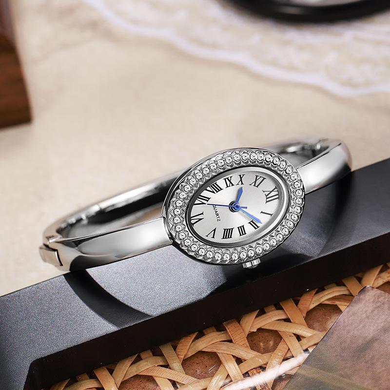 

Elegant Women s Oval Bangle Watch Crystal Bezel Gold Tone Quartz Wristwatch Ladies Dress Watch срібний