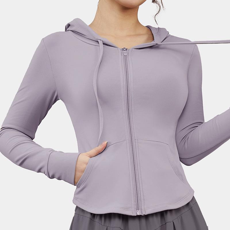 

Женский спортивный топ с капюшоном приталенного кроя и карманами на молнии - Одежда для йоги, бега и тренировок XXL