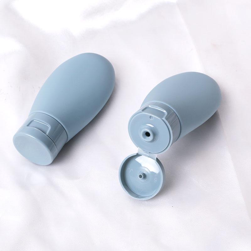 

Большая дорожная бутылочка-сжиматель объемом 60 мл для шампуня, геля для душа, лосьона или мыла светло-синий