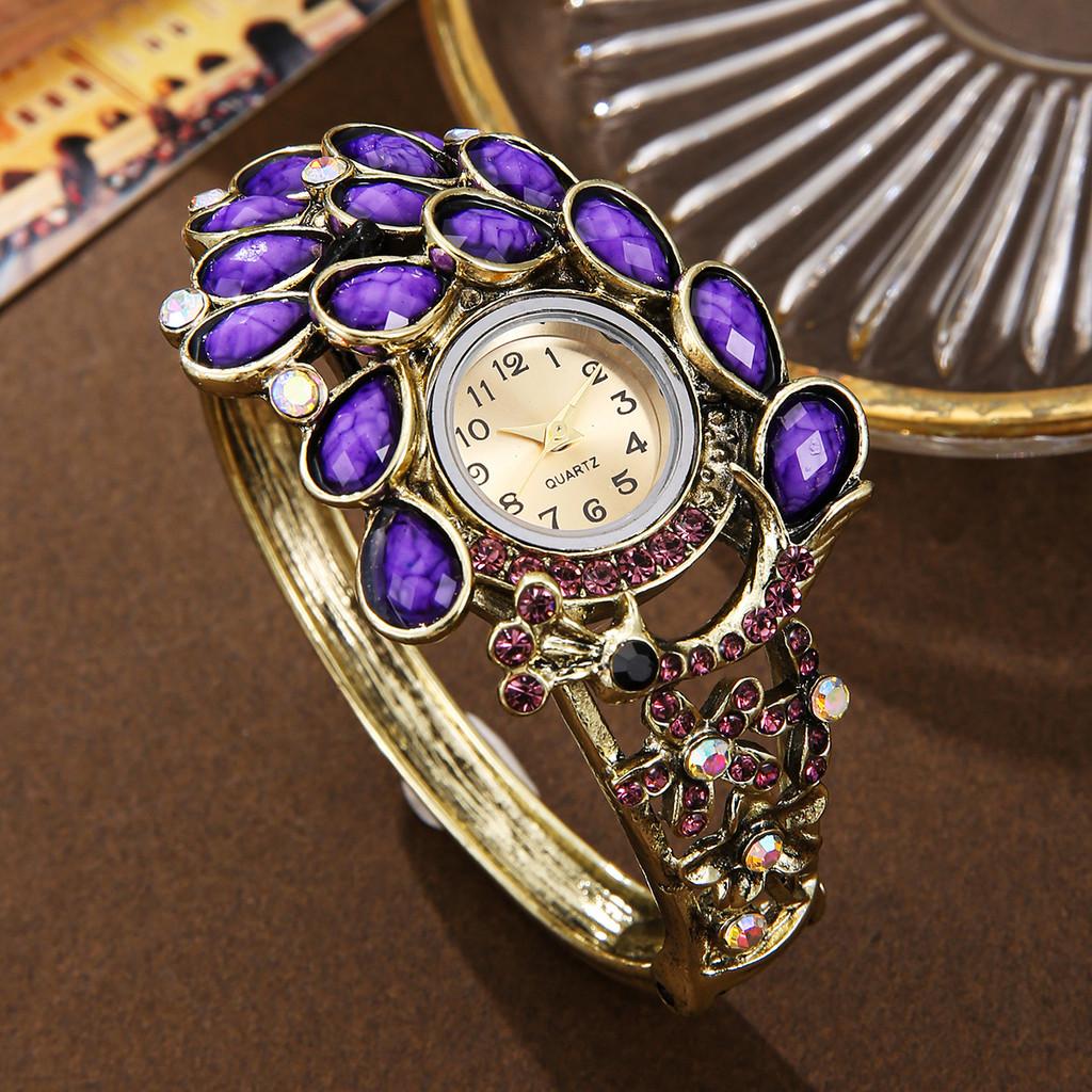 Orologio al Quarzo con Piuma di Pavone per Donna con Bracciale in Lega Accessorio di Moda