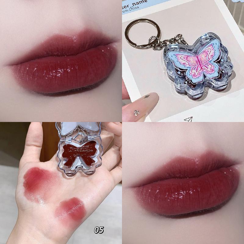 OUOII Luminous Butterfly Wing Lip Tint: Glossy, Plump, Long-Lasting, and Moisturizing Lip Gloss with Subtle Color.