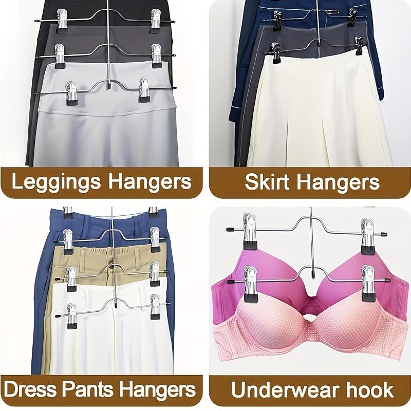 Four-layer dress hanger with 8 clips. Adjustable non-slip hanger. Made of stainless steel. Foldable for drying clothes.