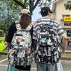 New Fashion Student Schoolbag Animation Printing Trend Fashion Backpack Men and Women Large Capacity Simple Graffiti Backpack