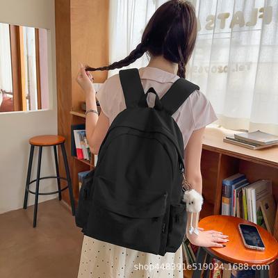 Zaino per la scuola zaino per studenti di grande capacità zaino casual tinta unita semplice nuovo zaino di grande capacità per studenti delle scuole medie all'ingrosso