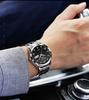 Men's Swiss Double Calendar Watch with Alloy Steel Band, Waterproof & Luminous.