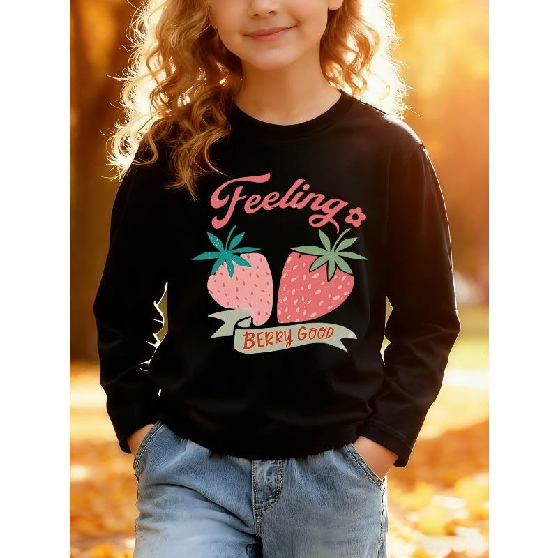 European sizes Long-Sleeved Top for Kids, Stylish Long-Sleeve T-Shirt with a Fun Strawberry Print, Featuring Playful Letter Designs.