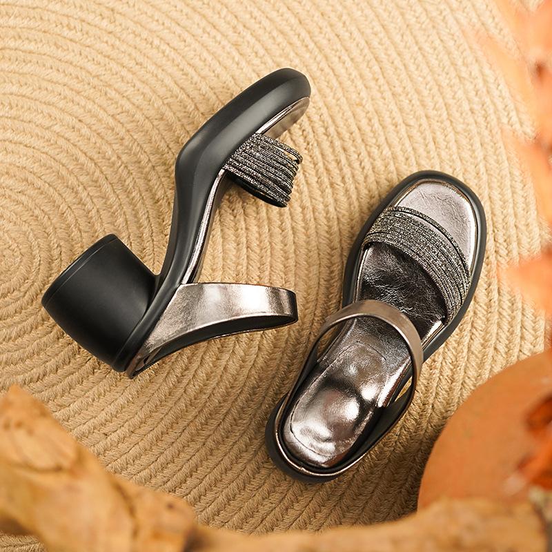 

Stepping on shit soft leather rhinestone sandals women s 2025 new summer wear cool slippers thick-soled high heels one-word drag 40