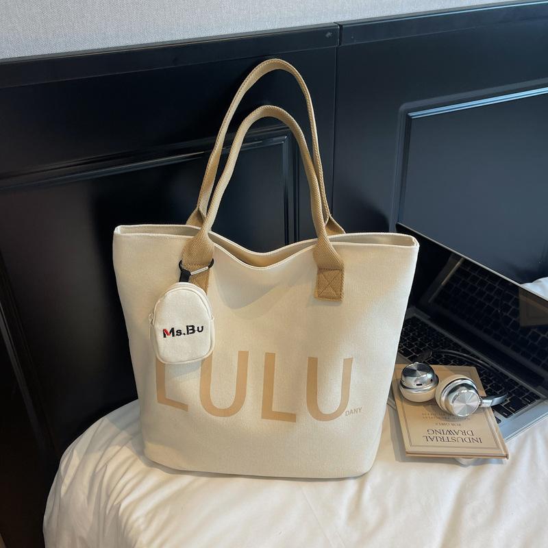 Women's bag 2025 summer new canvas shoulder bag commuter large capacity tote bag letter cloth bag handbag shoulder bag