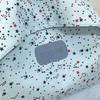 Star Print Backpack with Front Pocket and Side Drawstring Pockets for School and Casual Use
