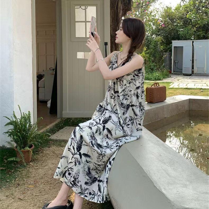 Coffee break French suspender dress children's summer new seaside vacation temperament high-end floral dress