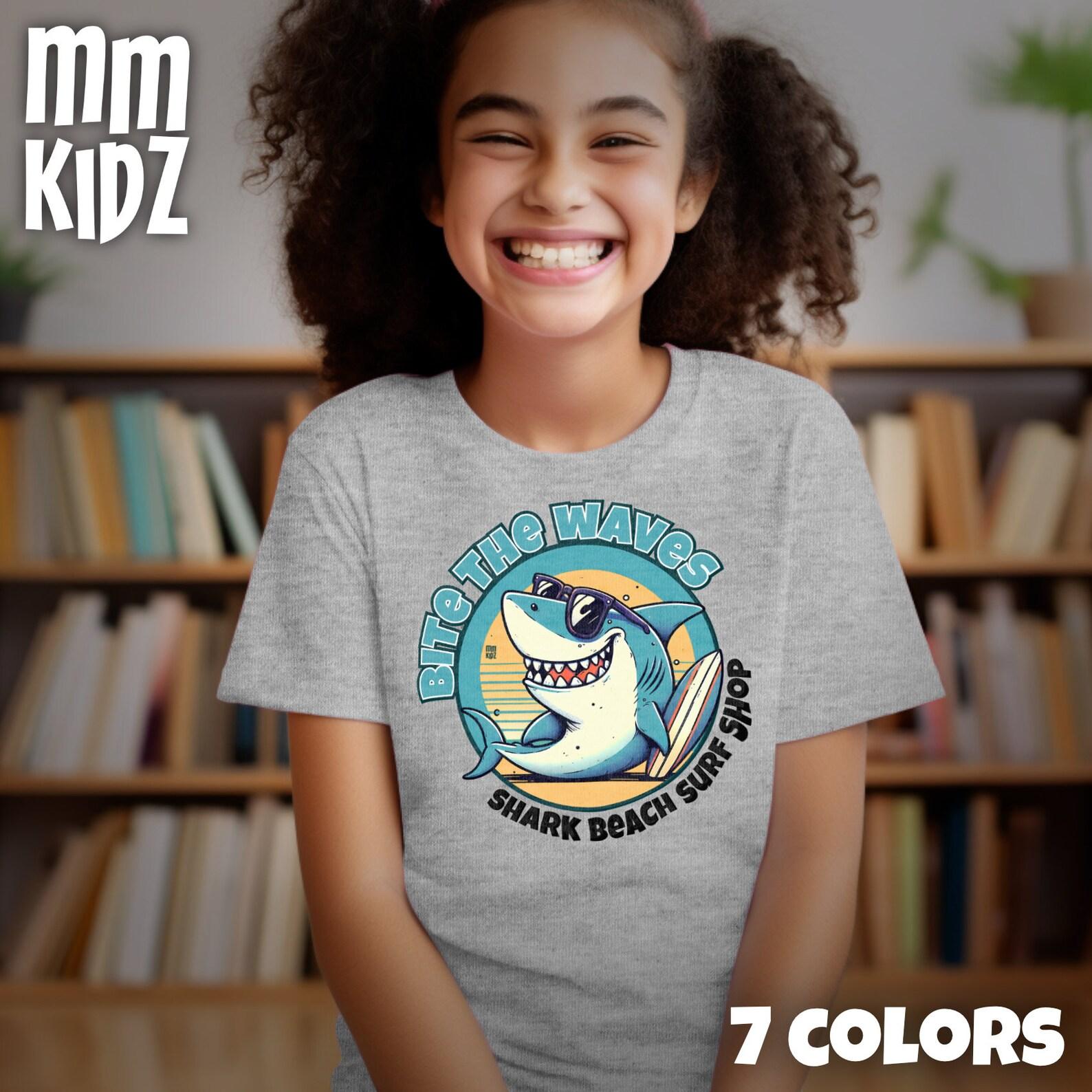 Cool Shark Surf T-Shirt for Kids | Fun Graphic Tee | Bite the Waves Shark Beach Surf Shop Shirt | Perfect Summer Gift for Kids 100