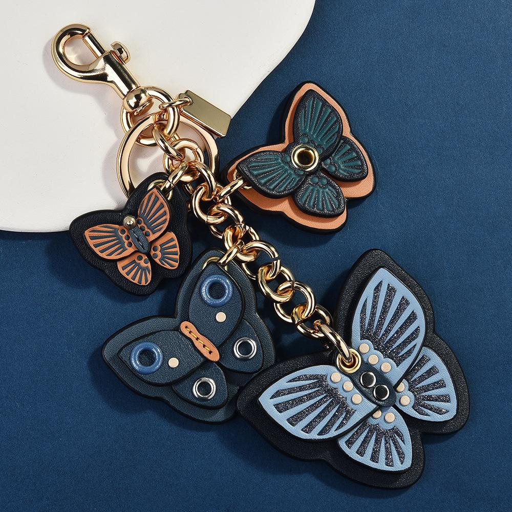 Bunte Schmetterlingsserie überlagerter Schmetterlingsschnur modischer Taschenanhänger Quaste Schmetterlingsanhänger