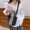 Hand-carrying Contrasting Striped Bucket Bag for Women's New Korean Style Niche Sports Commuter Shoulder Bag Versatile Crossbody Bag