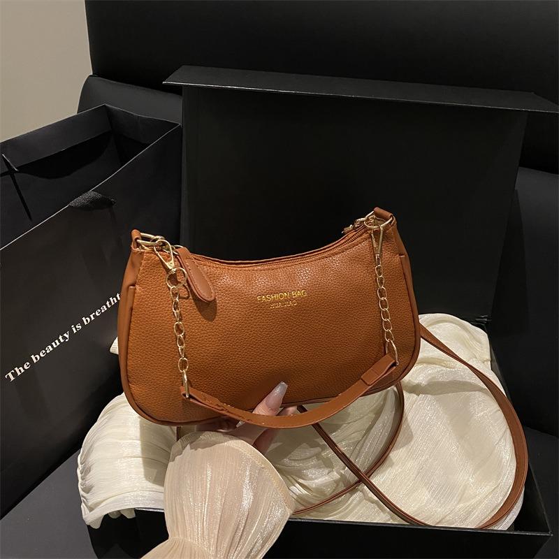 Fashion trend solid color underarm bag women's 2026 new shoulder handbag texture shoulder messenger bag handbag