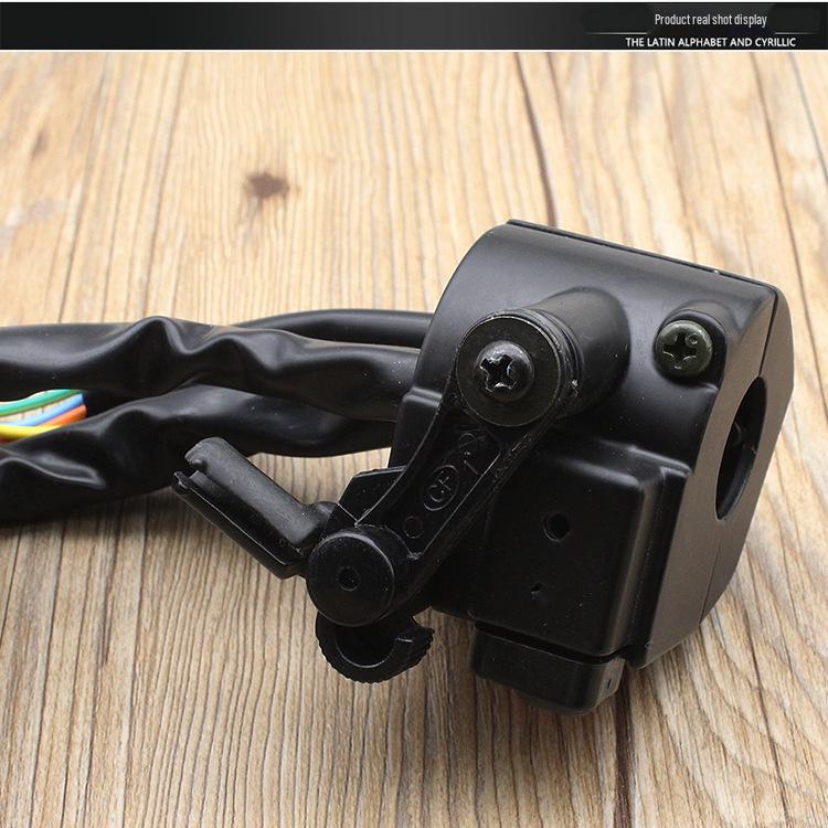 Motorcycle Handlebar Switch Assembly for Dayang DY100: Turn Signal, Headlight, and Horn Controls.