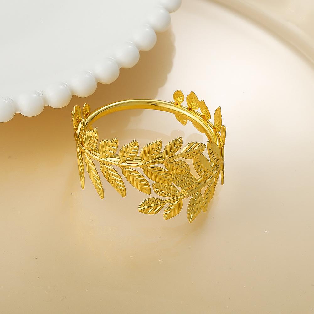 12 ks/lot Nový zlatý simulovaný list kroužek na ubrousky hotelový otevřený kovový držák na ubrousky jednoduchý list kroužek na ubrousky kroužek na ústní utěrku