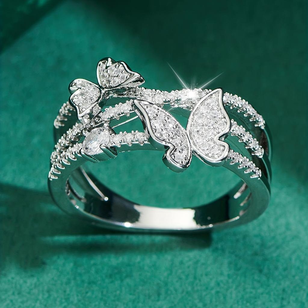 Sterling Silver Ring Features a Multi-layered Design, with a Cute Butterfly Embedded On the Band, Adorned with Sparkling Artificial Zirconia