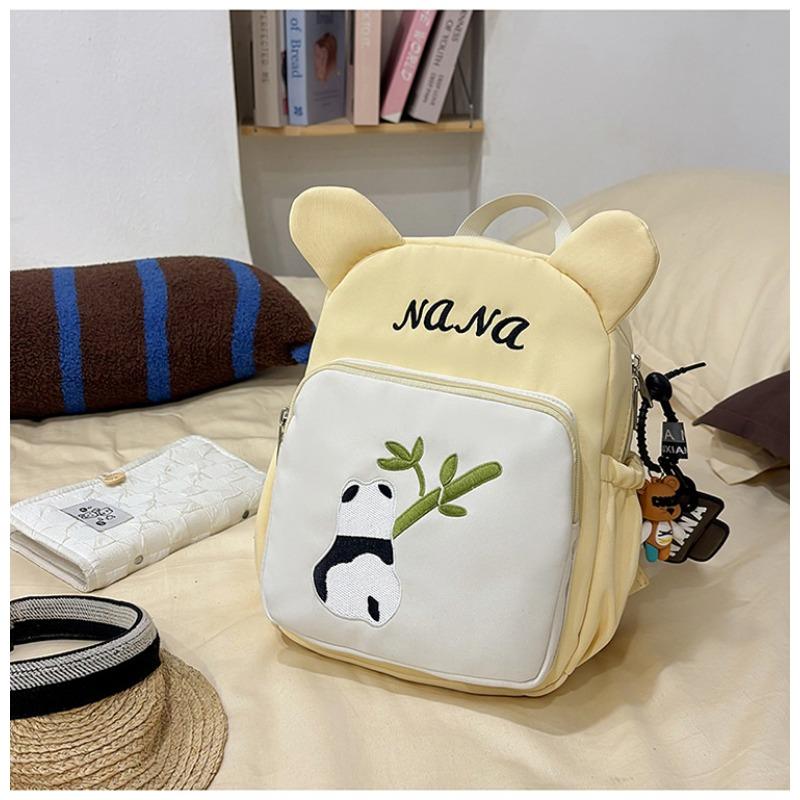 The new schoolbag is high-value, fresh, sweet and cute, red panda backpack, kindergarten level 1-3 large-capacity backpack.