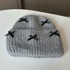 Wool hat women's autumn and winter new bow knitted hat shows a small face, warm ears, bag head, all-match cold hat