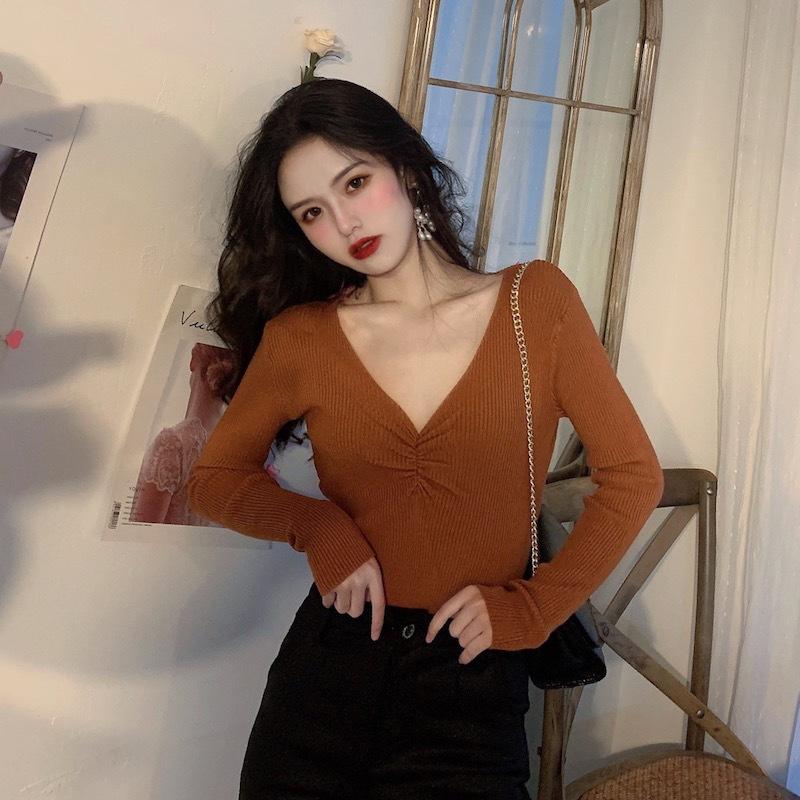 Otoño Invierno mujer cuello en V Color sólido manga larga plisado parte inferior de punto suéter elegante