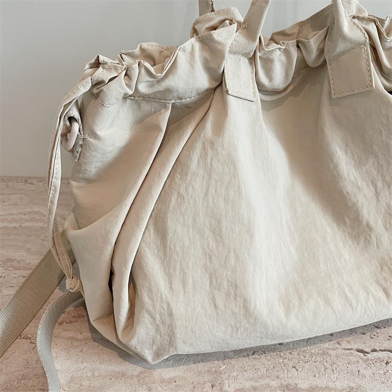 Einfarbige Kordelzug-Handtasche Damen-Schultertasche Große Kapazität Pendler-Crossbody-Tasche