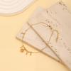 Elegant Gold Hollow Cross Flower Bell Anklet - Luxury Niche Design Foot Jewelry