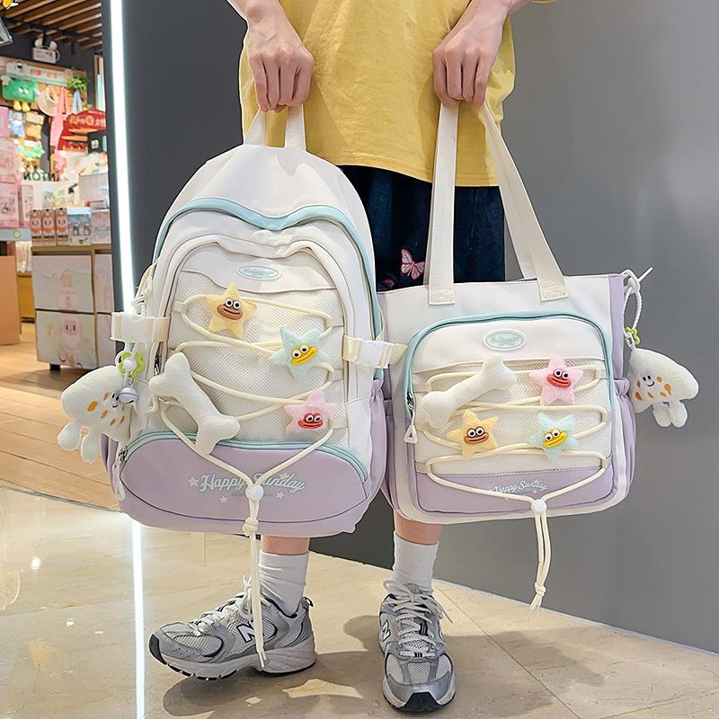 High-value cute primary school student spine care schoolbag female junior high school girl high school student backpack burden reduction