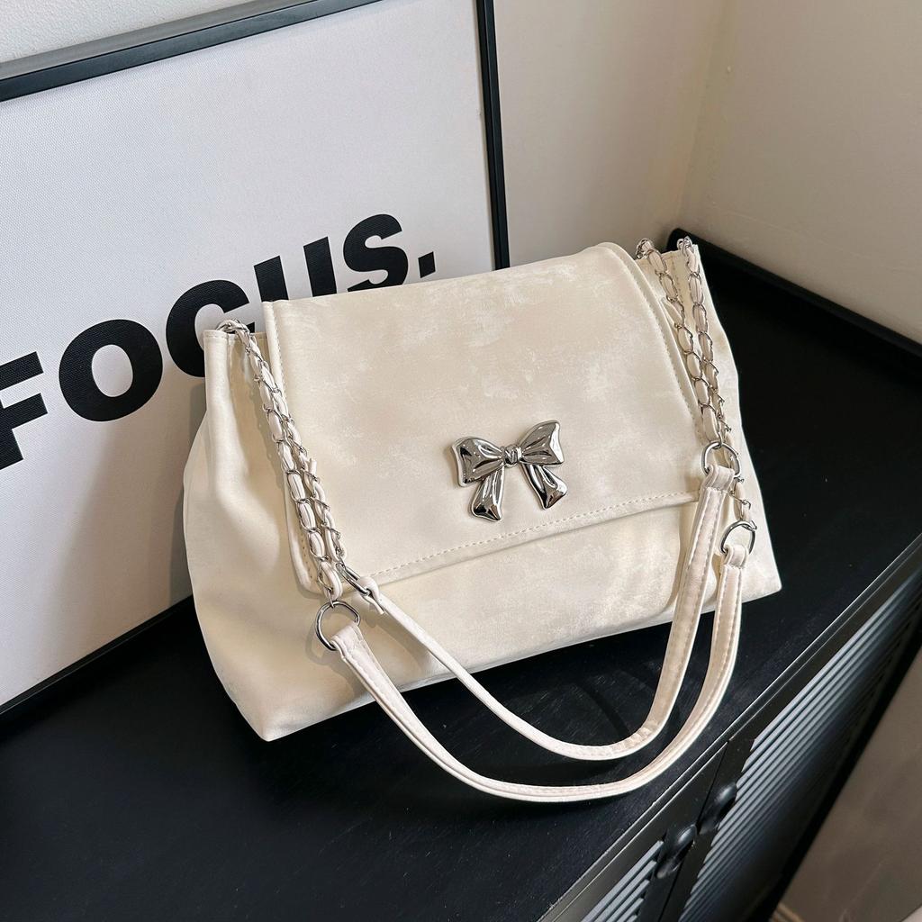 New large-capacity commuter bag bow decoration versatile armpit bag saddle bag light luxury women's bag chain bag soft bag