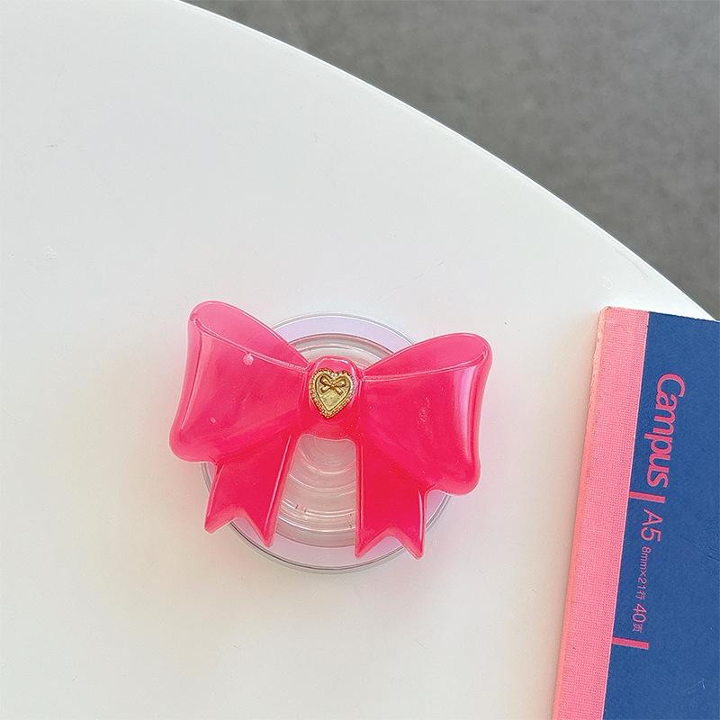 Small Love Three-Dimensional Bow Mobile Phone Airbag Bracket Magnetic Suction Telescopic Folding Desktop Bracket Wind