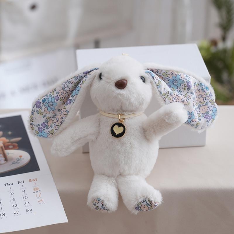 Rabbit Floral Cute Doll Designed With A Heartshaped Pendant For Holiday Present