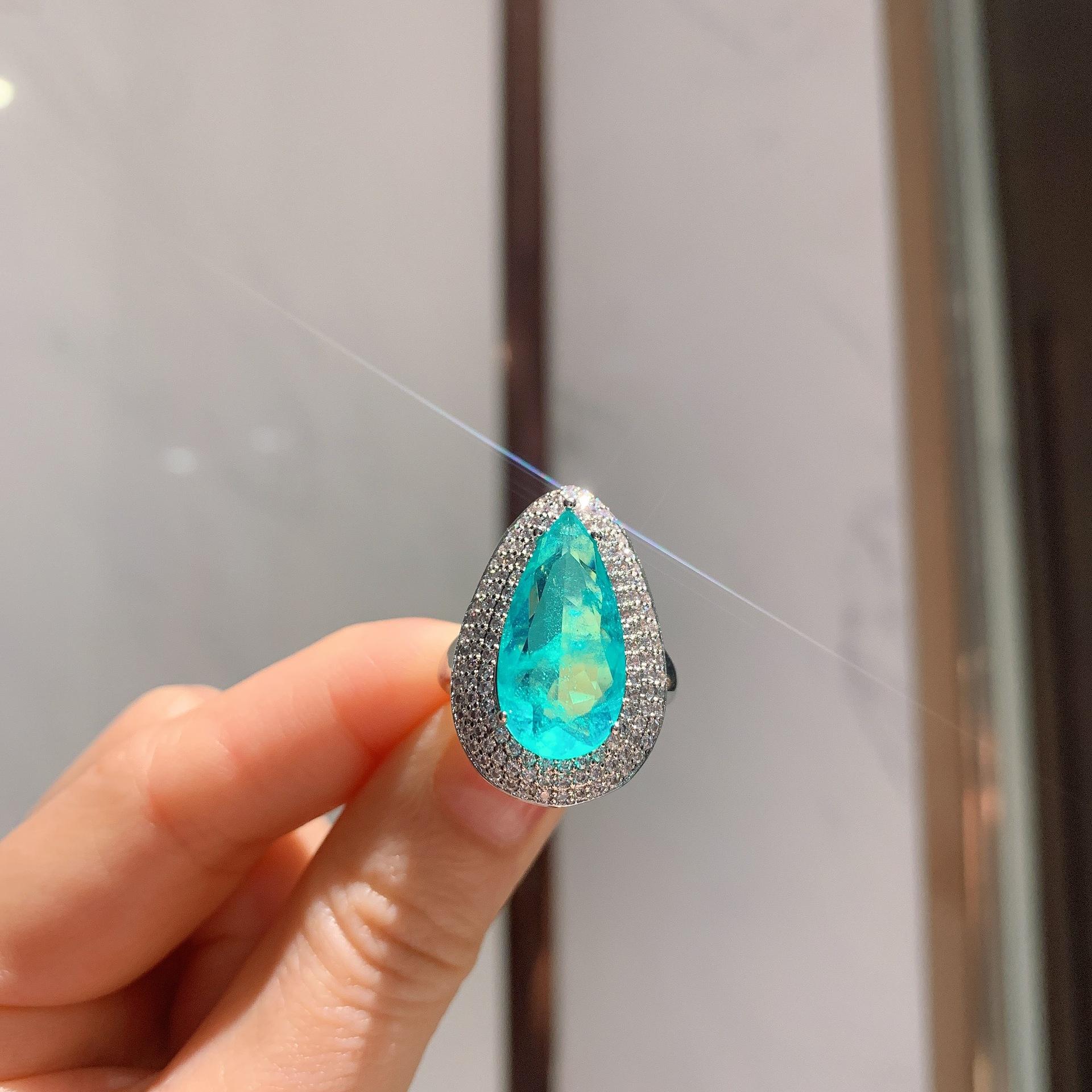 

Ювелирные изделия Цветной сокровище Имитация Параиба, Неоновый зеленый, Серьги-пусеты Основной камень 10 * 20 Подвеска 10 * 20