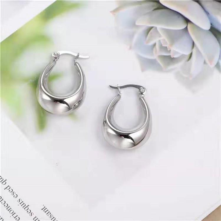 

European-American Fashion Titanium Steel Hollow Bow Heart Earrings for Women