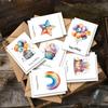 Prendas e souvenires – Postais