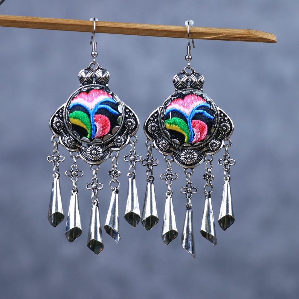 Chinese Retro Plum Blossom Fan Earrings: Women's Qipao Bell Tassel Pendants for Hanfu