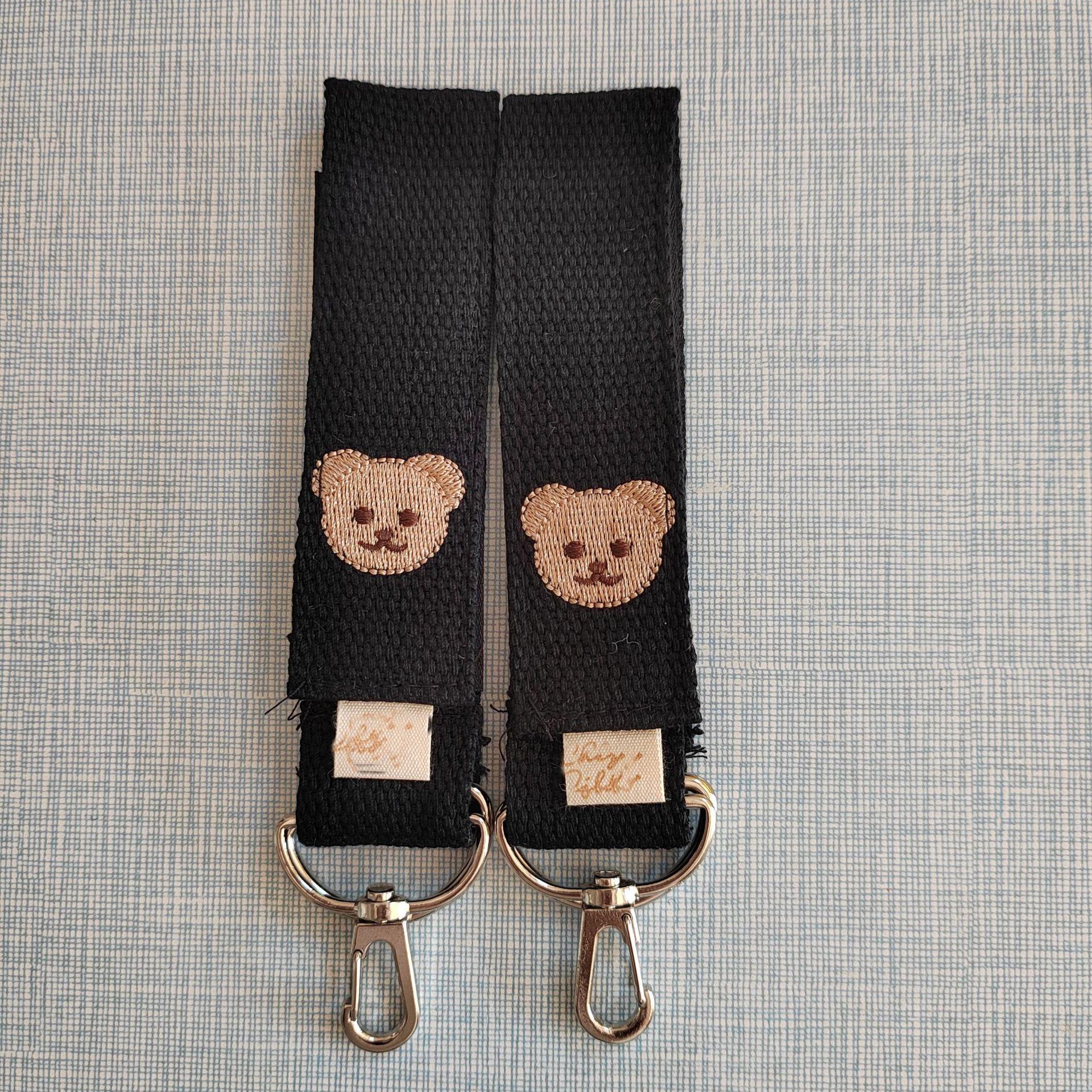 

Embroidered Bear Stroller Hook: Universal Baby Stroller Storage Accessory 23*3 cm
