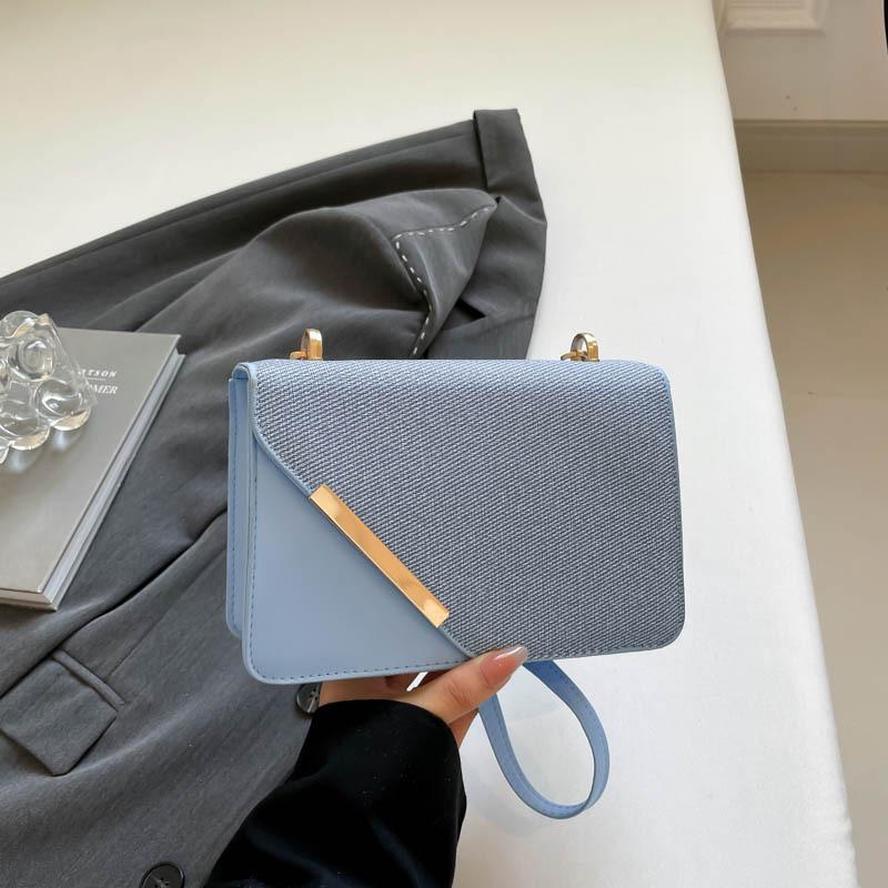 

Popular diagonal light luxury design sense new contrasting color temperament small square bag casual high value single shoulder messenger bag синий