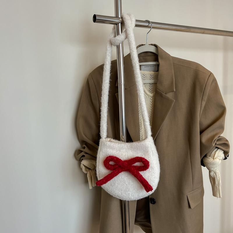 Korean spring new fashion niche design large-capacity student foreign style bucket bag women's shoulder trend oblique span bag