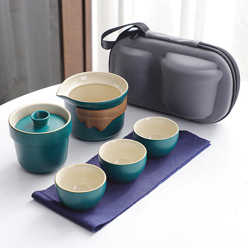

Travel tea set, portable small bag, black pottery, easy to carry outdoors, a pot of three cups of express cup