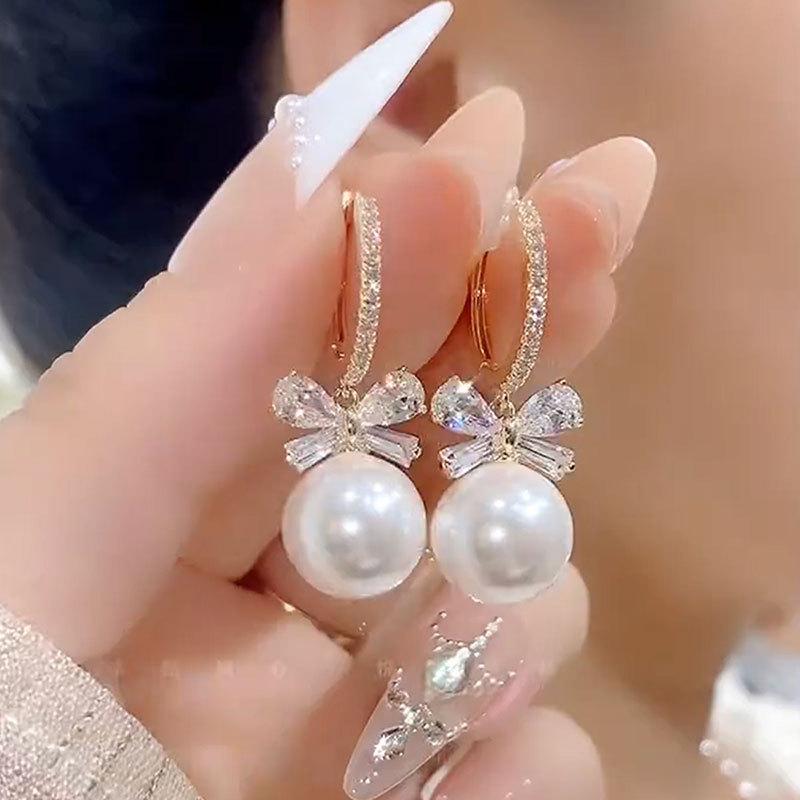 Temperament Bow Pearl Ear Buttons Light Luxury Sense of Senior Sense of Popular Earrings Temperament Hundred with The Fashionable Earrings