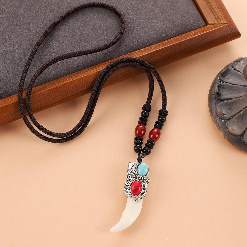 Retro woven dog tooth necklace men's and women's long niche personalized wolf tooth pendant pendant sweater chain accessories