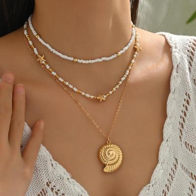 Seestern & Muschel Anhänger Halskette - Vielseitiger Modeschmuck mit Reisperlen Schlüsselbeinkette für Frauen.