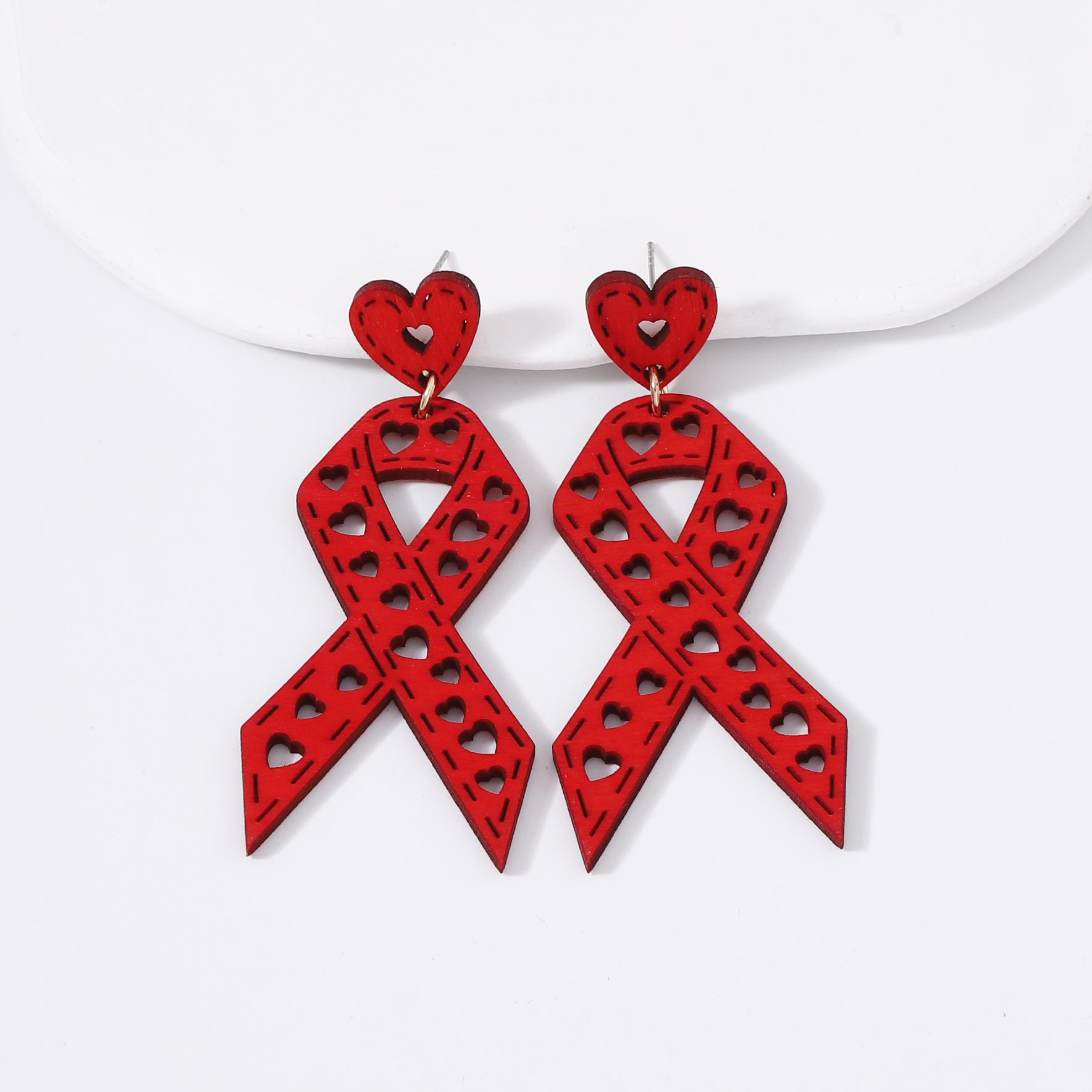 

New Korean version of niche design earrings, laser-cut wood chips with hollowed-out red ribbon earrings, simple and trendy ear hooks