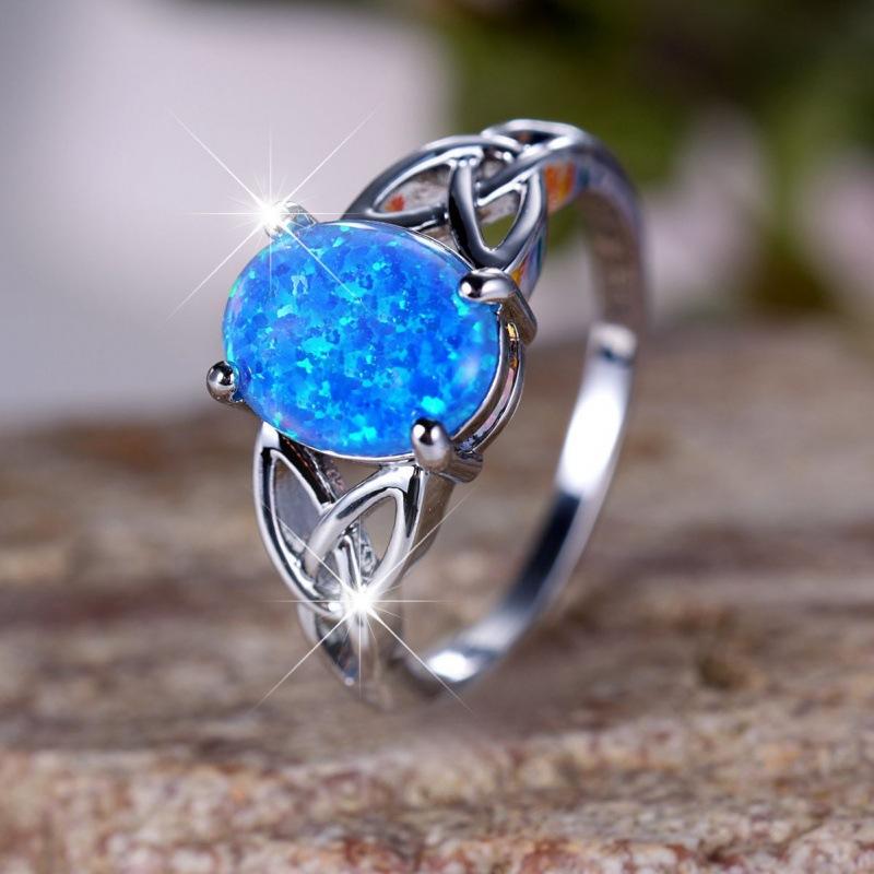 Palladium White K Egg Blue Opal Edge Cross Ring